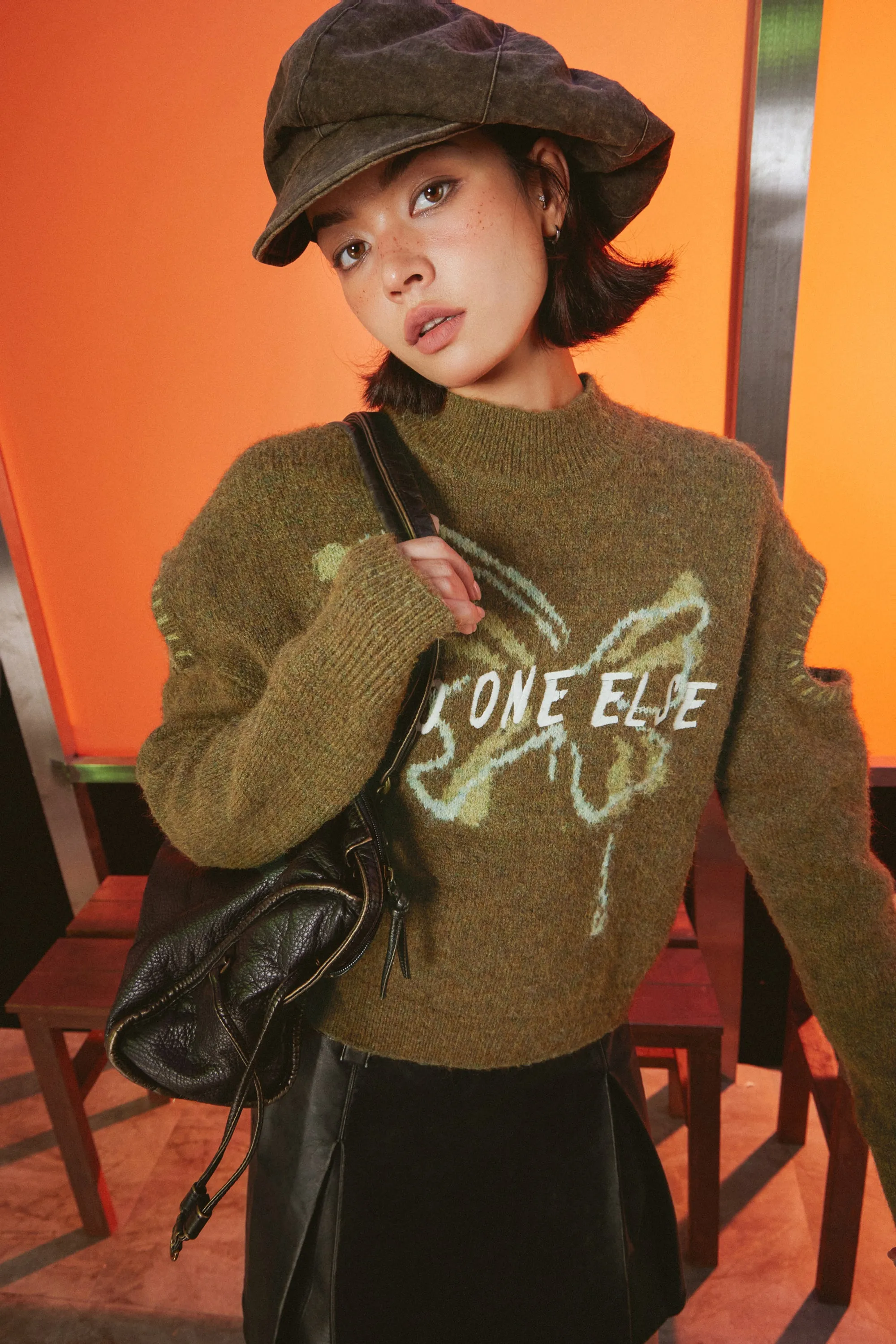 Butterfly Logo Sleeve Slit Knit Sweater